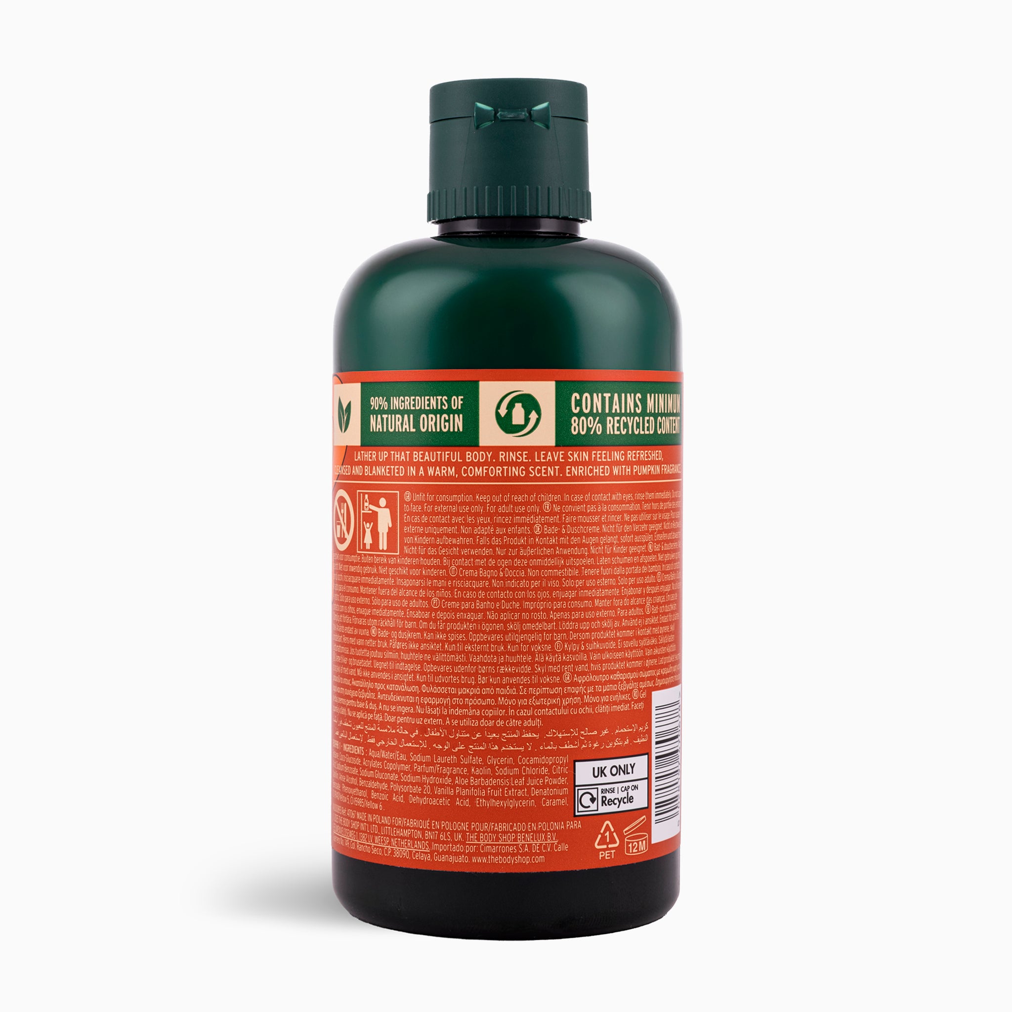 Bottle with a green cap and orange label on a white background