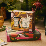 The Body Shop Shea Handcare Trio set with decorative packaging on a table.