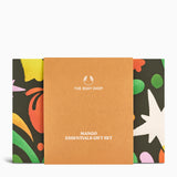 The Body Shop Mango Essentials gift set packaging with colorful floral designs on a white background