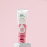 Tube of The Body Shop Vitamin E Barrier Boost Cream on a pink background