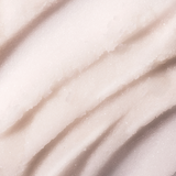 Close-up of smooth, light pink cream texture