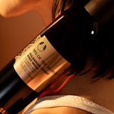 Bottle of Spa of the World Bulgarian Peony Body Wash with a label on a blurred background