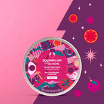 Body butter container with colorful label on a pink and purple background