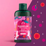 Bottle of Sugarplum Passion bath and shower gel with colorful label on a pink and purple background.