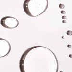 Close-up of oil and water bubbles on a white background