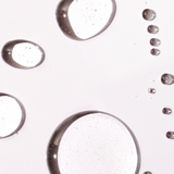 Close-up of oil and water bubbles on a white background