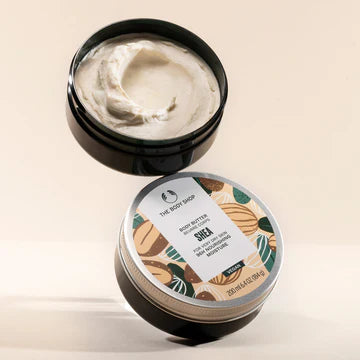 Two containers of a product with a label on a beige background