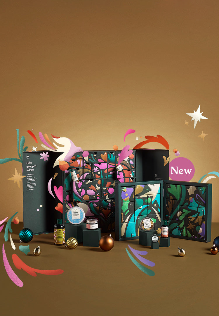 Cosmetic products with colorful packaging on a brown background