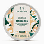 The Body Shop Almond Milk body butter container on a white background