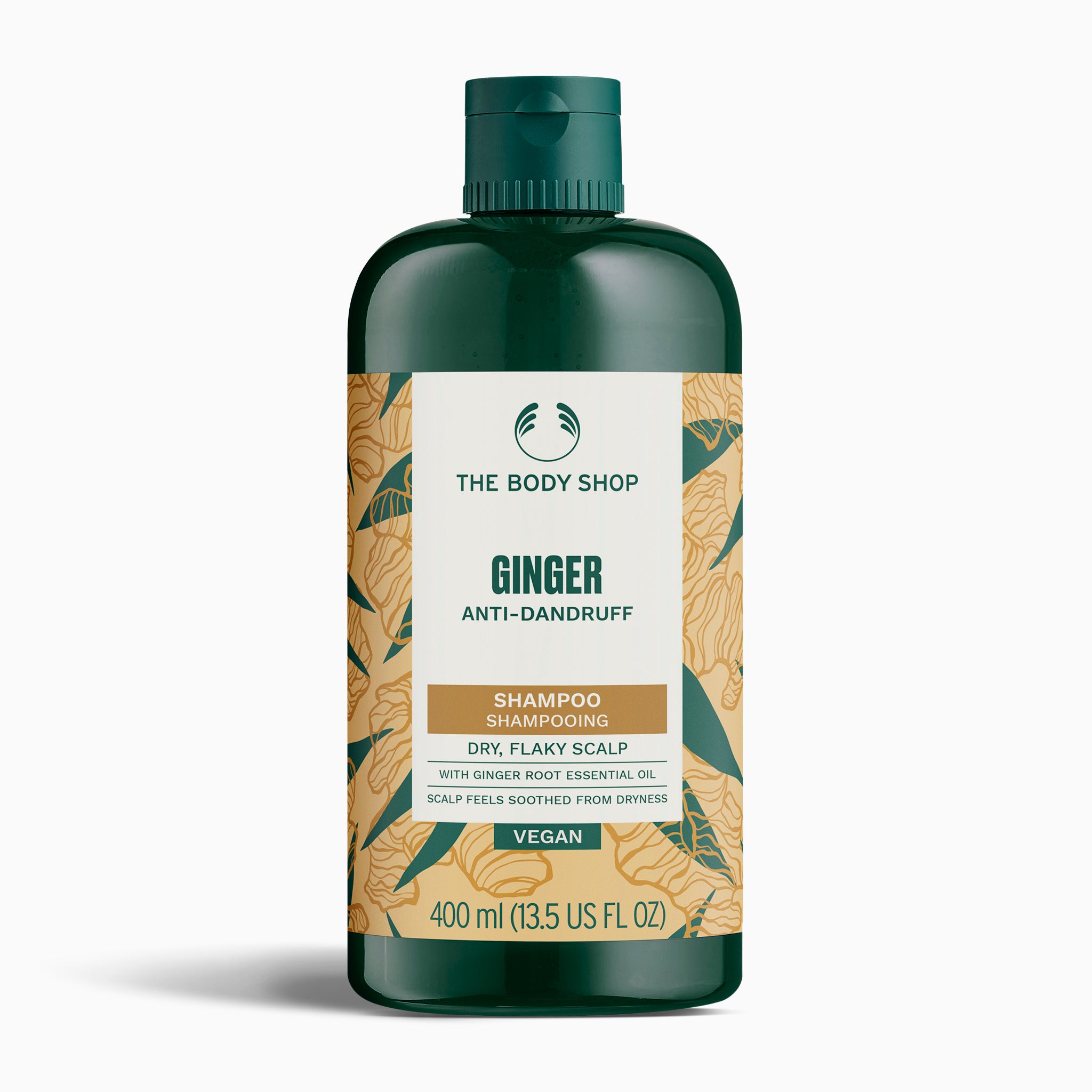 The Body Shop Ginger Anti-Dandruff shampoo bottle on a white background