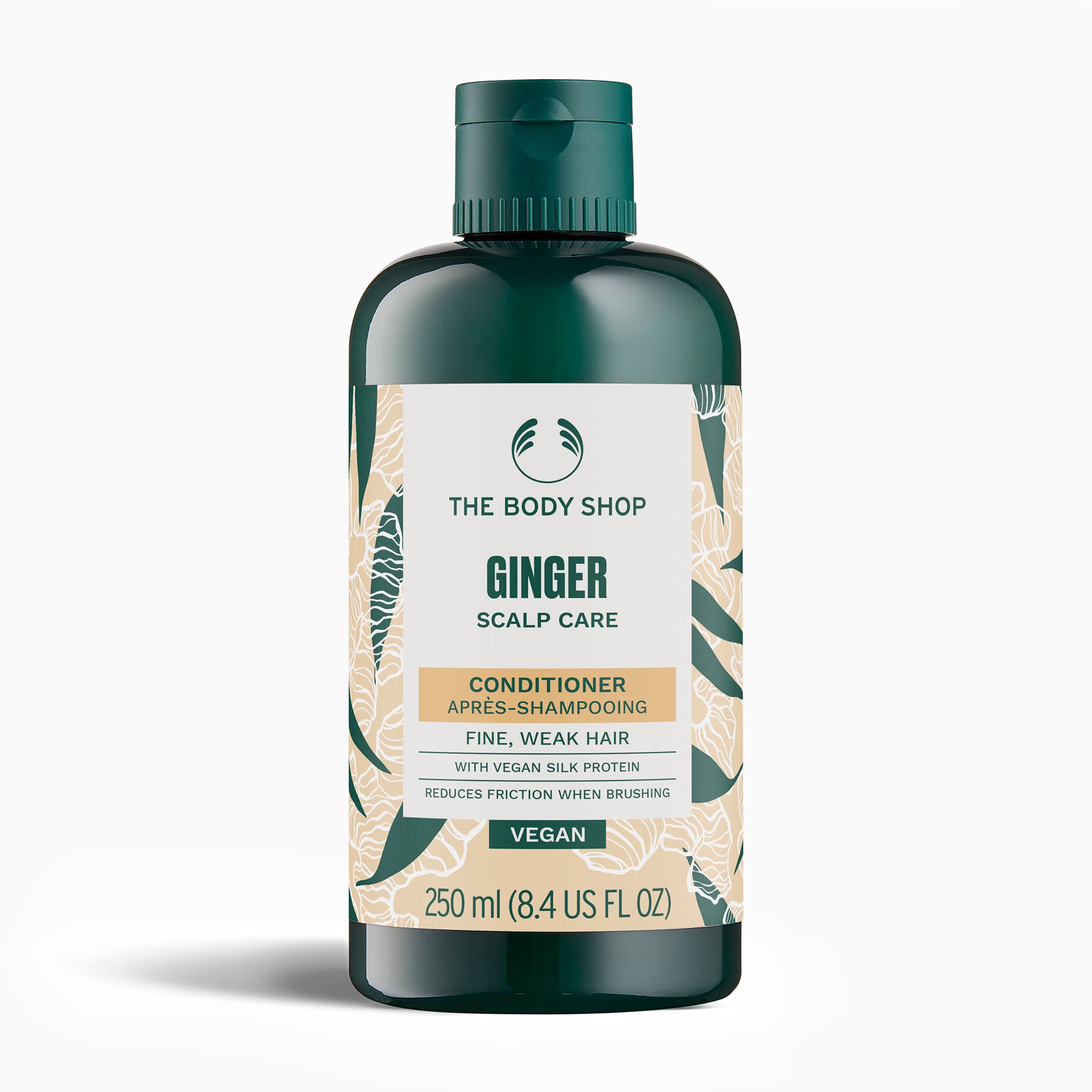 The Body Shop Ginger Scalp Care conditioner bottle on a white background