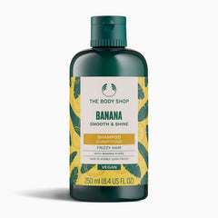The Body Shop Banana Smooth & Shine shampoo bottle on a white background