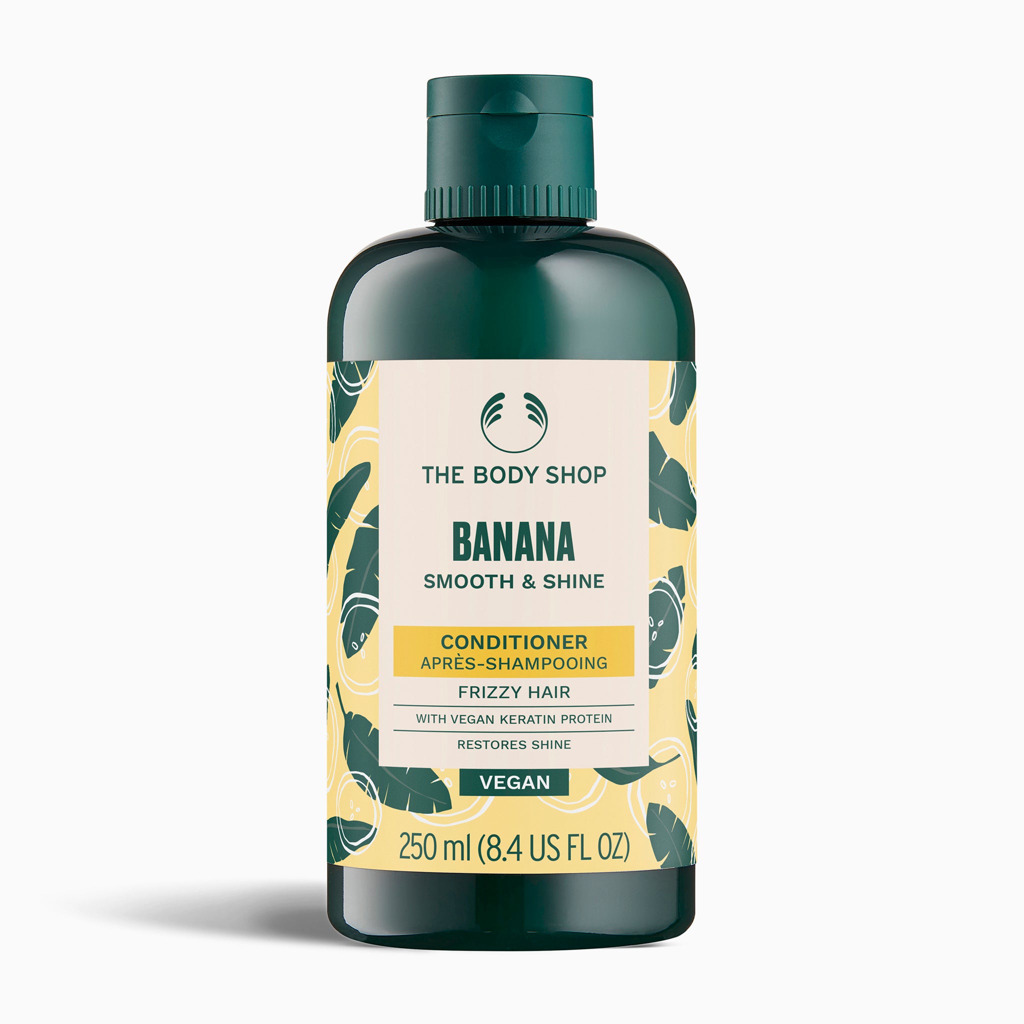 The Body Shop Banana Smooth & Shine conditioner bottle on a white background