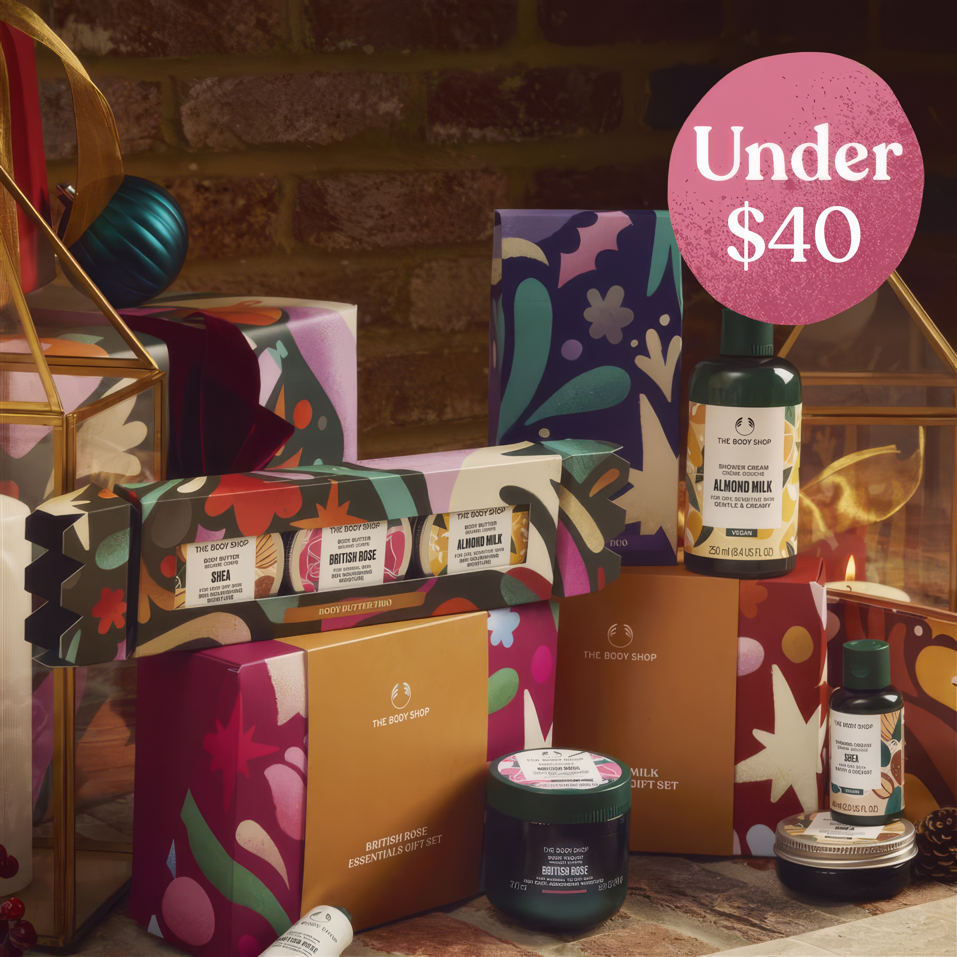 The Body Shop products with decorative boxes and 'Under $40' text on a festive background.