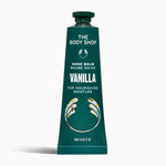 Green tube of The Body Shop Vanilla hand balm on a white background
