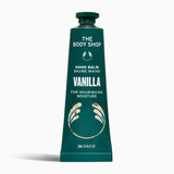 Green tube of The Body Shop Vanilla hand balm on a white background