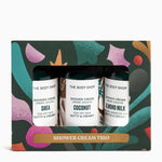 The Body Shop shower cream trio set in a decorative box with abstract patterns.