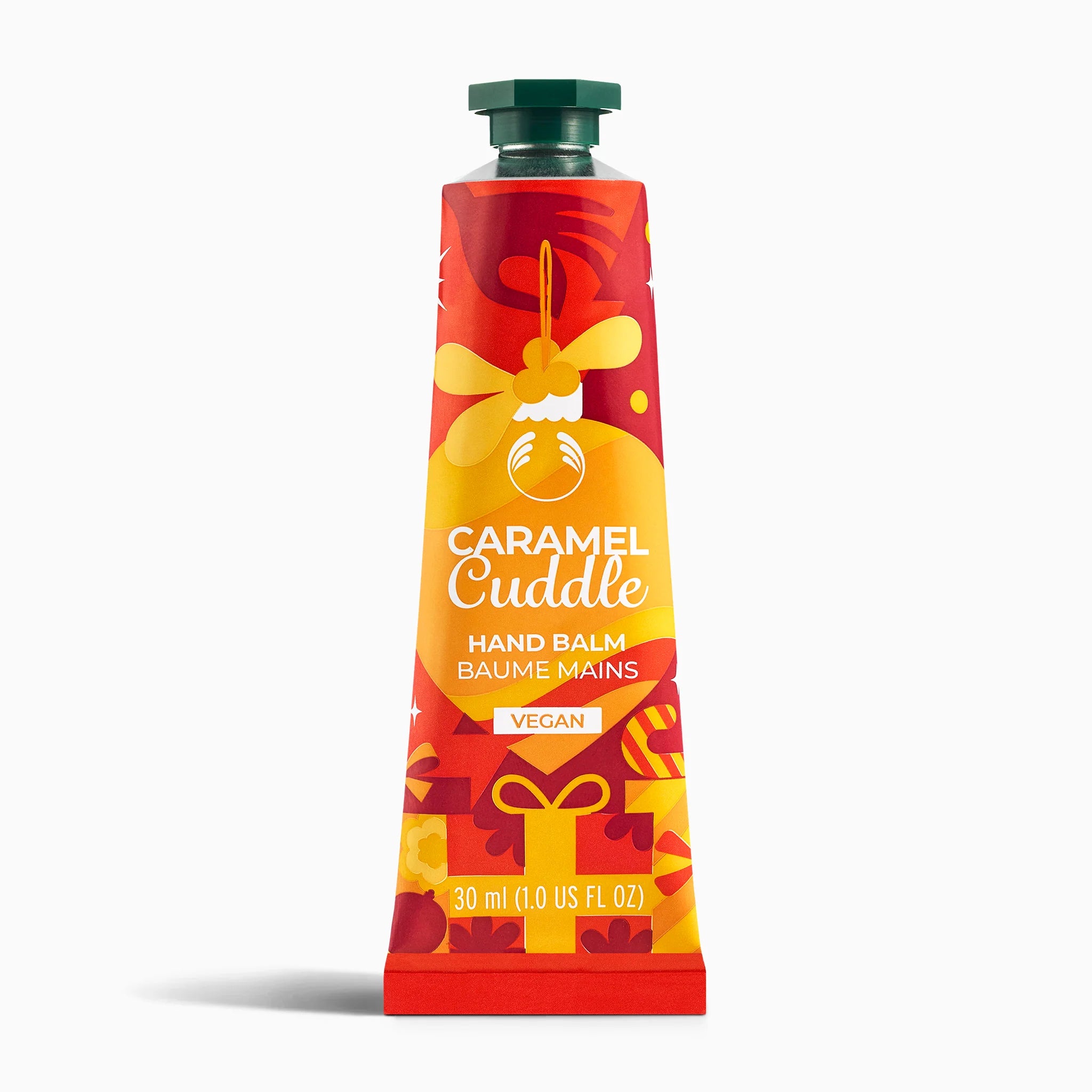 Caramel Cuddle hand balm tube on a white background