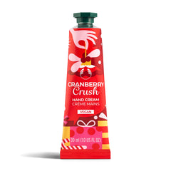 Red tube of Cranberry Crush hand cream on a white background