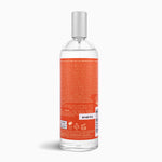 Clear bottle with a red label on a white background