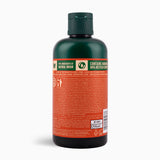 Bottle with a green cap and orange label on a white background