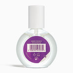 Perfume bottle with a purple label on a white background