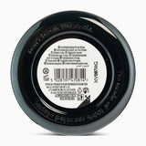 Back of a black jar with text and a barcode on a white background