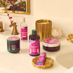 Bathroom counter with skincare products featuring pink and green packaging.