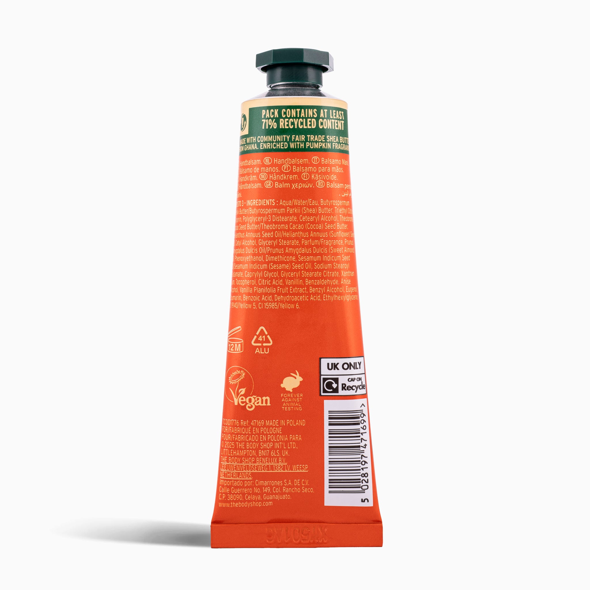 Orange tube with black cap on a white background