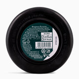 Black container lid with text and recycling information on a white background