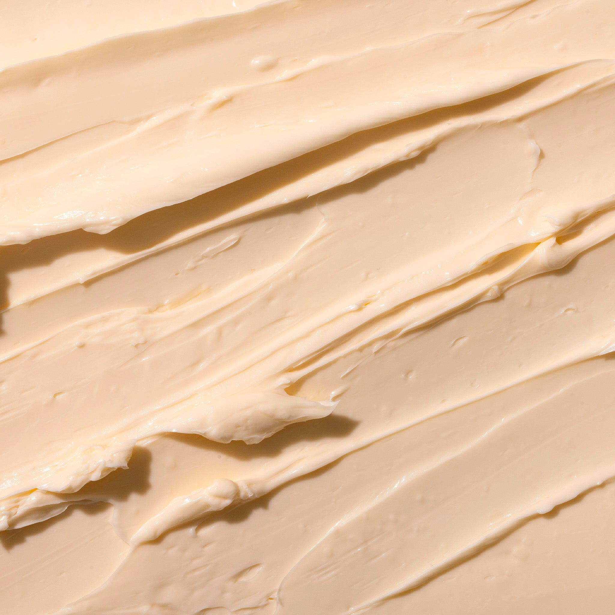 Close-up of smooth, beige cream texture