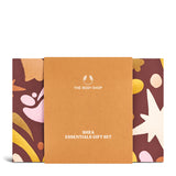 The Body Shop Shea Essentials gift set packaging with floral designs on a white background