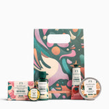 The Body Shop gift set with various products including a soap, lotion, and body butter on a white background.