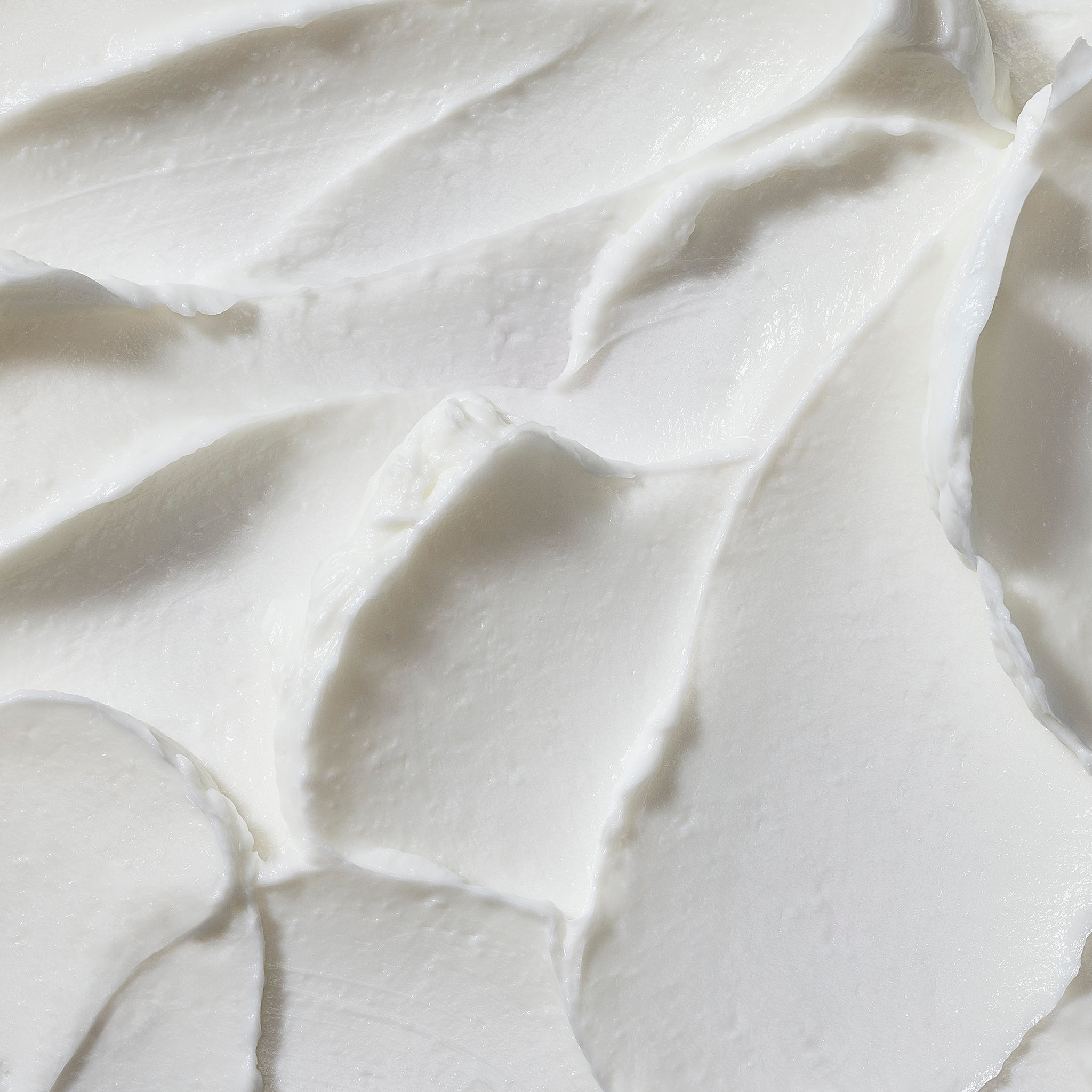 Close-up of smooth, white cream texture