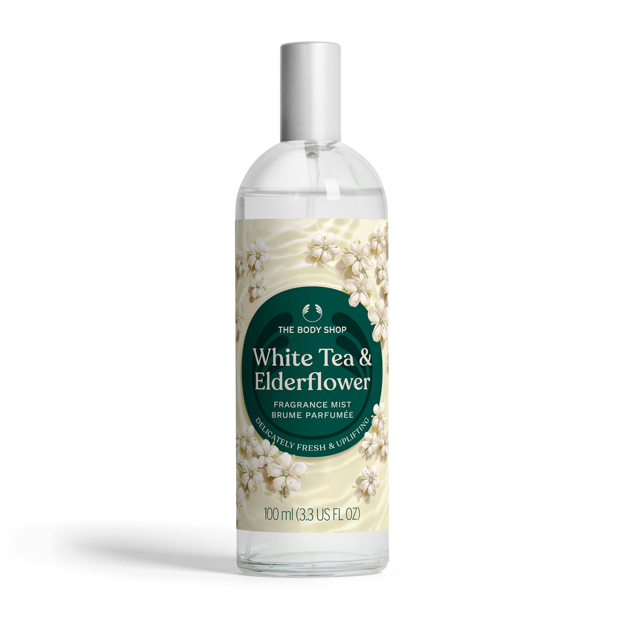 Fragrance mist bottle labeled 'White Tea & Elderflower' by The Body Shop on a white background