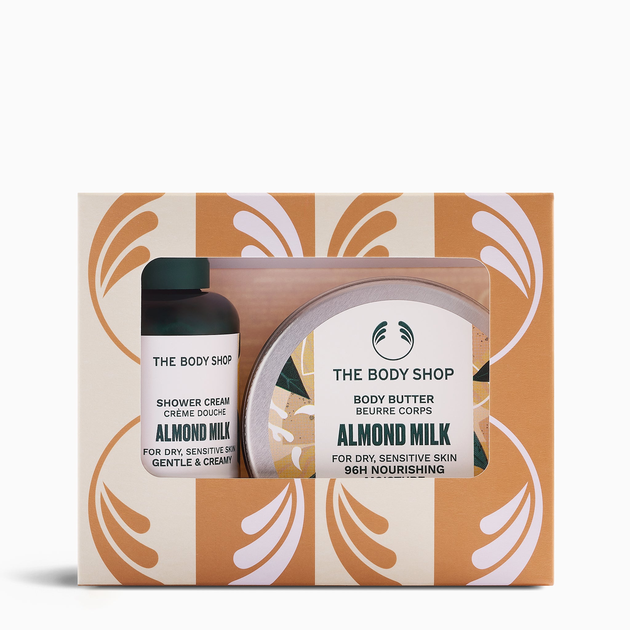 The Body Shop almond milk body care set in a decorative box on a white background