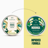 Two round tubs of The Body Shop Moringa Body Butter are shown side by side on a split white and pale yellow background, with a dotted arrow between them and the text 'IMPROVED FORMULA' below.