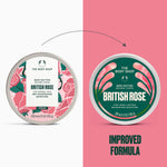A split graphic showing two round tubs of The Body Shop British Rose body butter before and after an improvement. The left tub has a pink rose pattern with a white label, and the right tub has a green rose pattern with a white label.