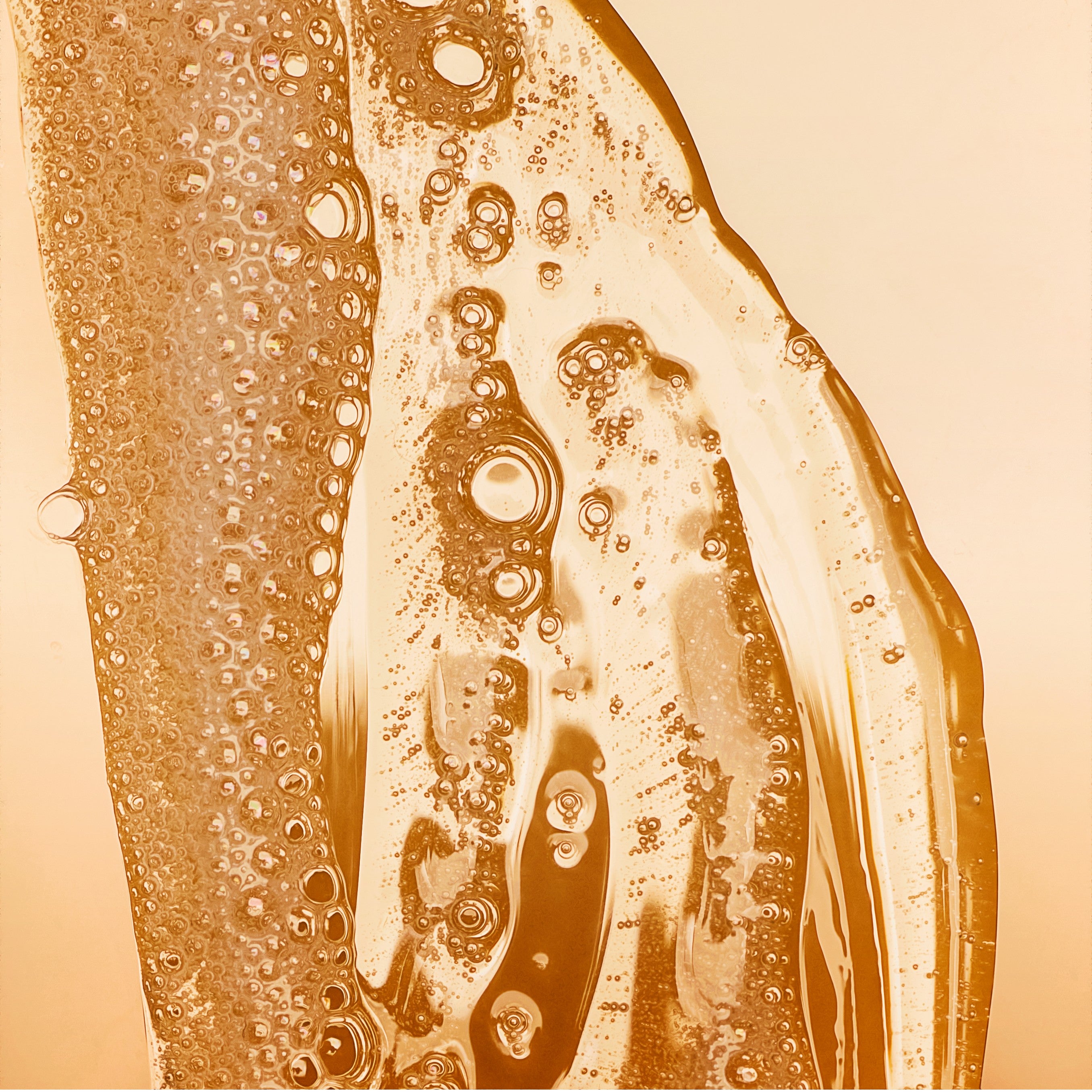 Close-up of a shower gel with bubbles and patterns
