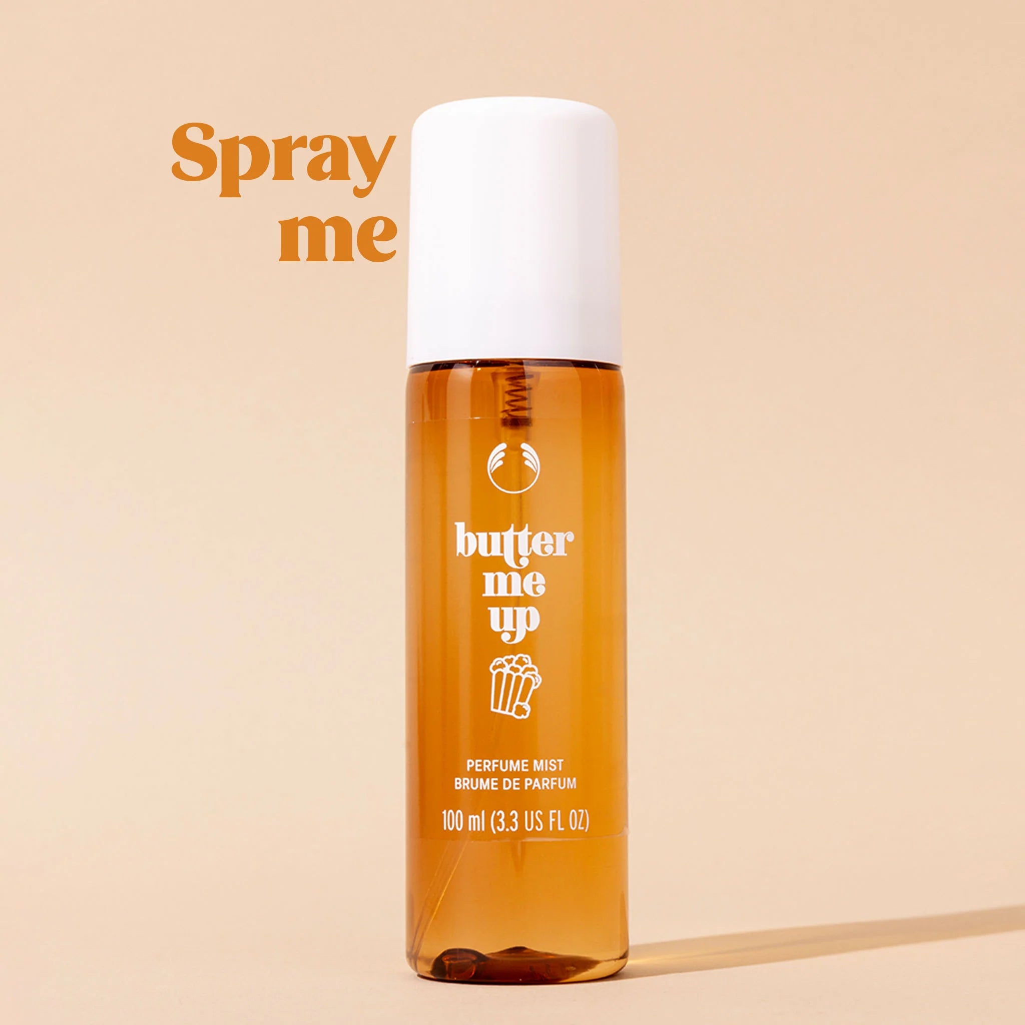 Butter me up perfume mist bottle on a beige background with 'Spray me' text.