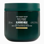 The Body Shop Almond Milk body yogurt jar on a white background