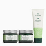 The Body Shop aloe skincare products including cream jars and a tube on a white background