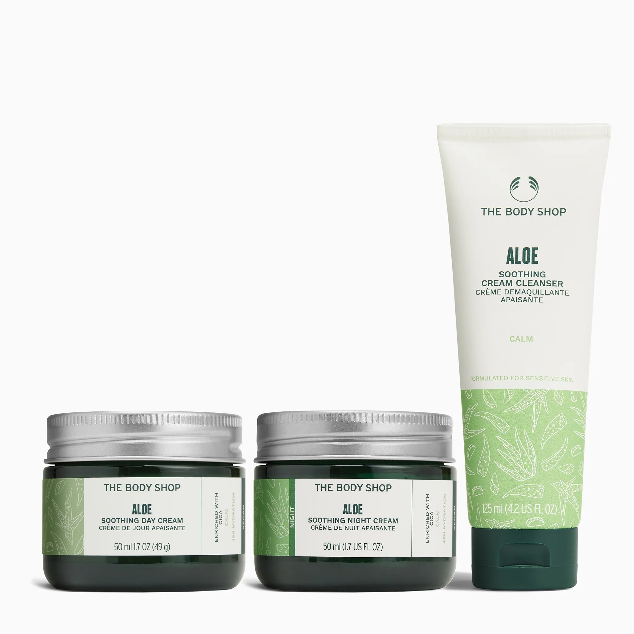 The Body Shop aloe skincare products including cream jars and a tube on a white background