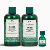 The Body Shop Tea Tree Skin Clearing Facial Wash, Toner, and Purifying Gel on a white background