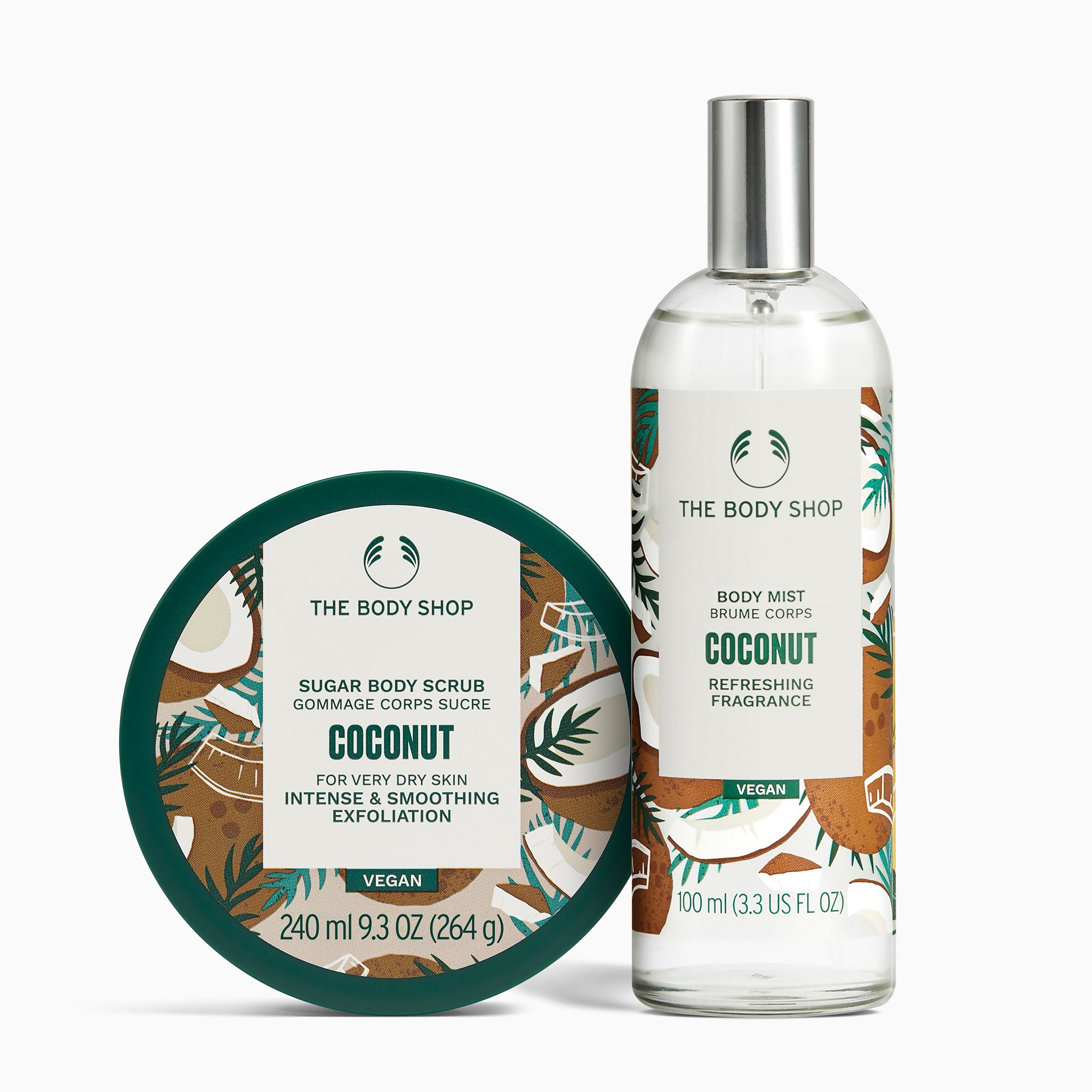 The Body Shop coconut-themed body scrub and body mist on a white background