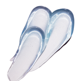 Two translucent, clear silicone or plastic inlay pieces with a glossy finish, arranged diagonally on a solid white background.