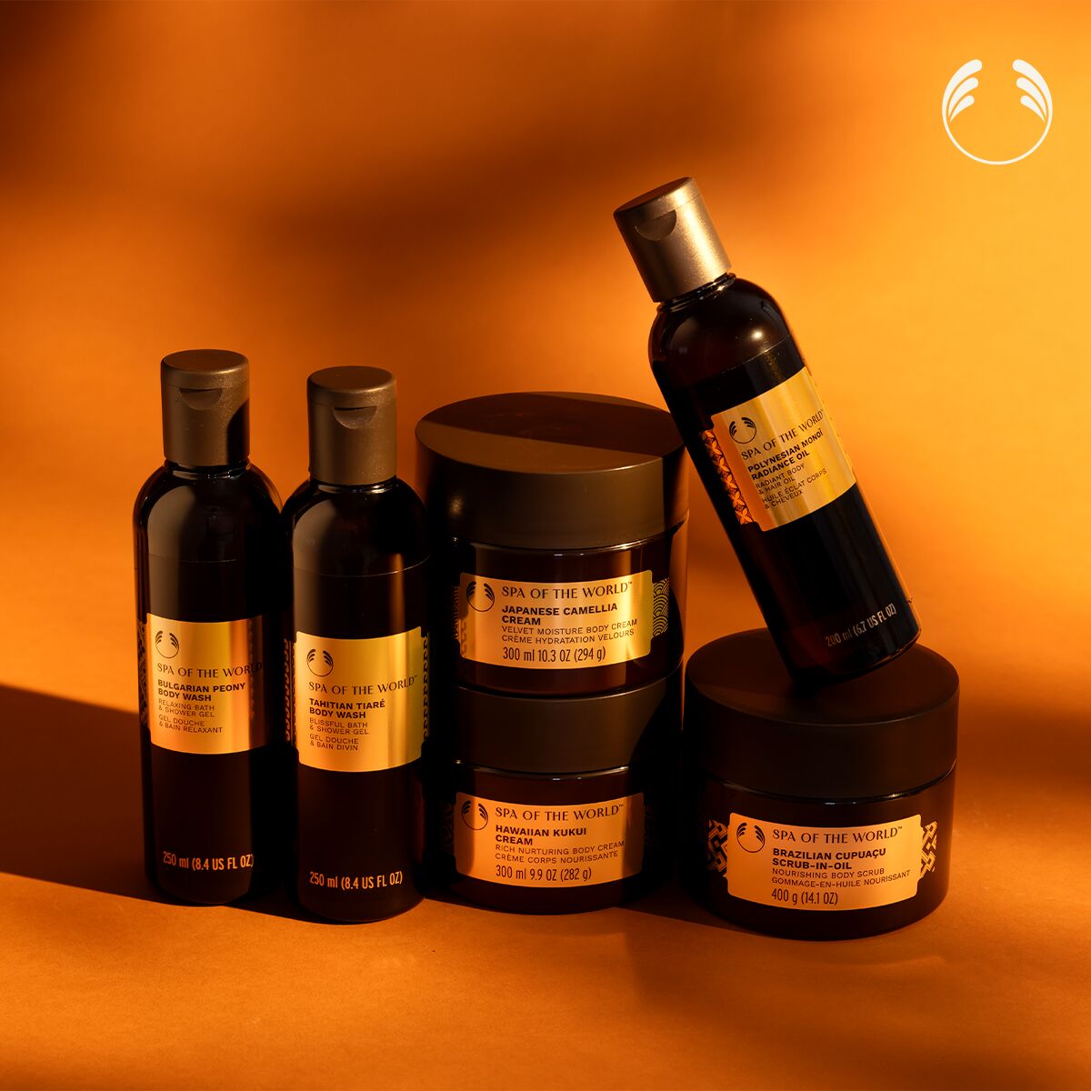 Spa of the World skincare products on an orange background