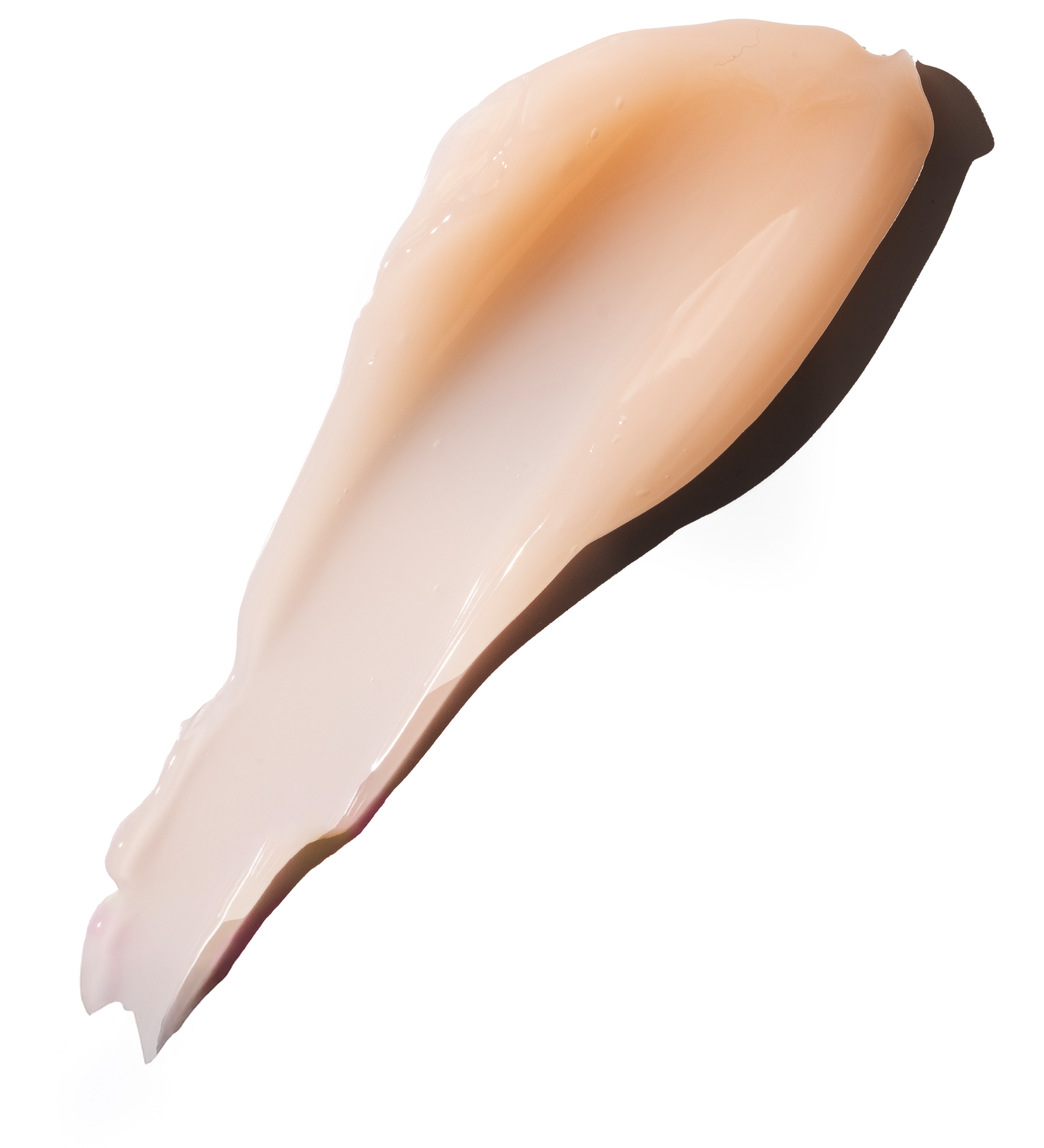 A thick, glossy smear of light peach-beige cream or gel makeup swatch on a solid white background.