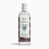 The Body Shop Tender Tonka fragrance mist bottle on a white background
