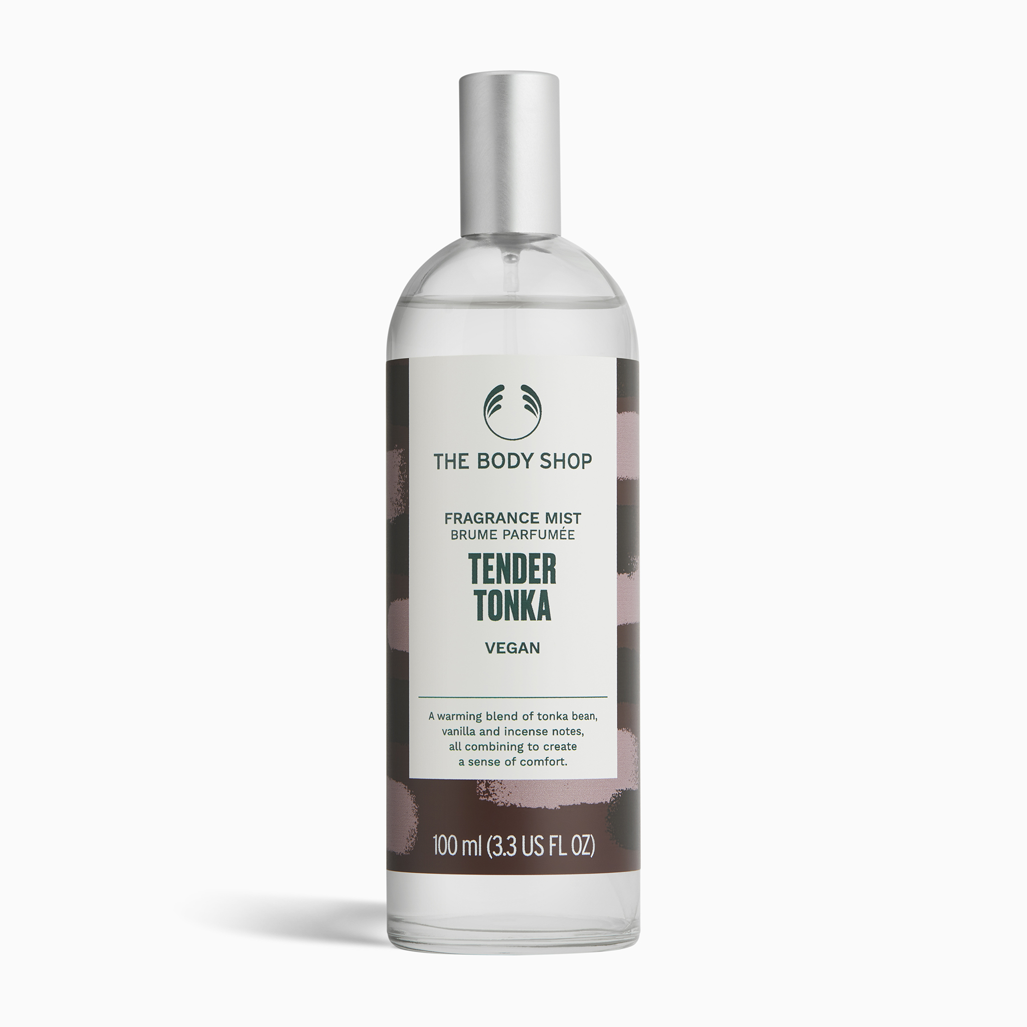 The Body Shop Tender Tonka fragrance mist bottle on a white background